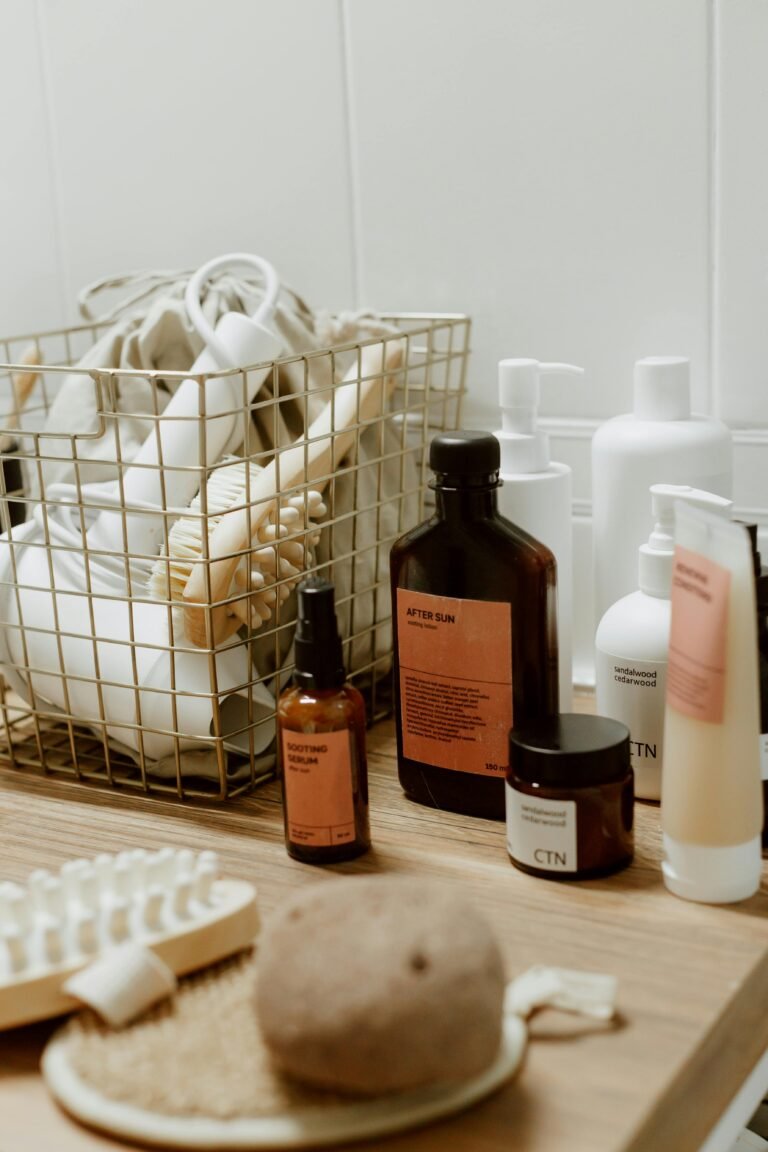 Elegant bathroom setup featuring various cosmetic bottles and a basket holding toiletries.